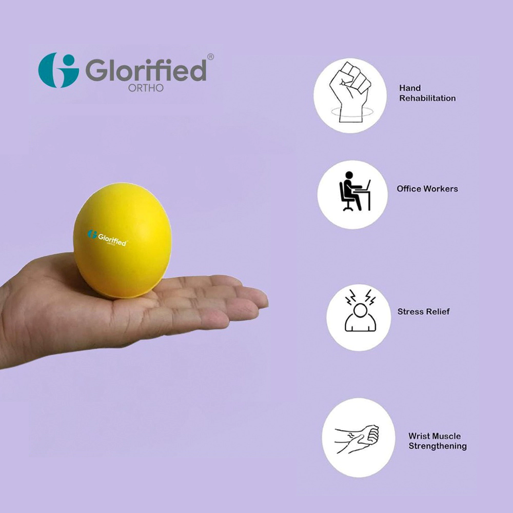 Soft yellow stress relief exercise ball for hand therapy and relaxation